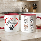 Two mugs with husky designs on a kitchen counter