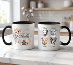 Two mugs with pet-themed designs on a kitchen counter.