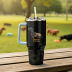 Two black tumblers with handles on a table, featuring patriotic designs.