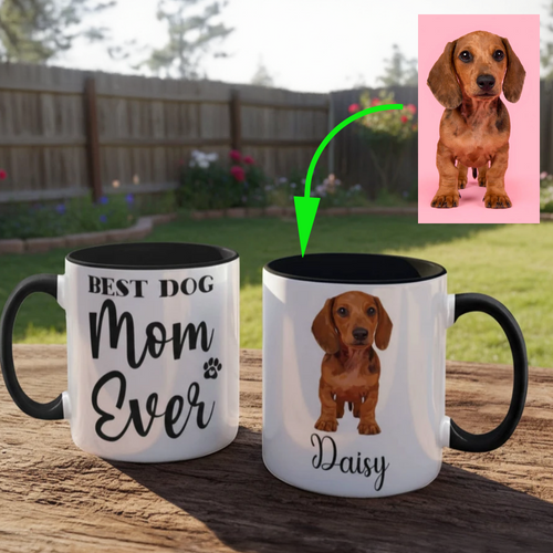 Two mugs with a dachshund illustration and text on a wooden surface.