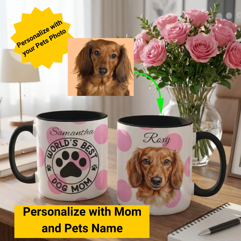 Two mugs with dog-themed designs and a photo of a dachshund, placed on a surface with flowers and stationery.