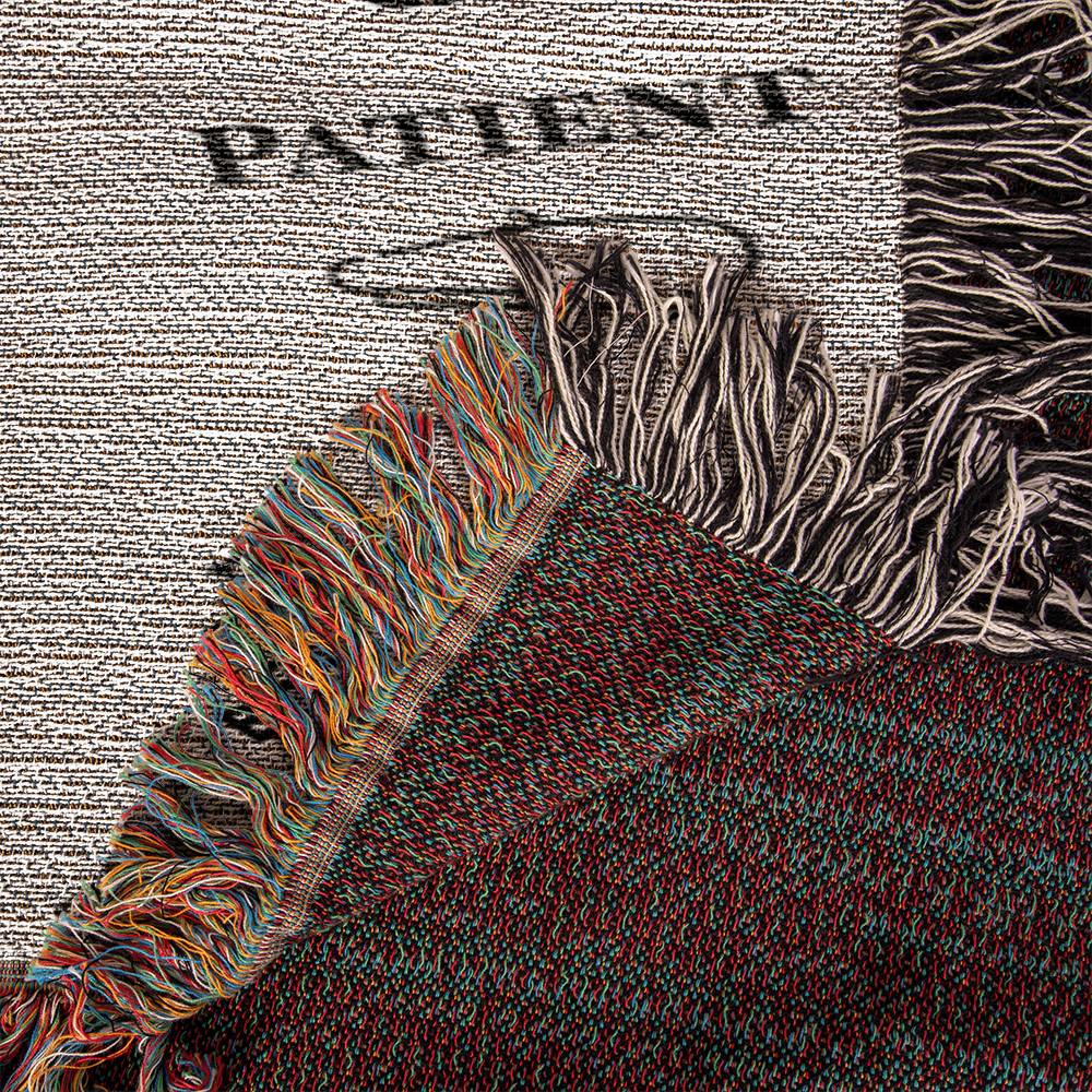 Textile with fringes and a textured background