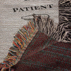 Textile with fringes and a textured background