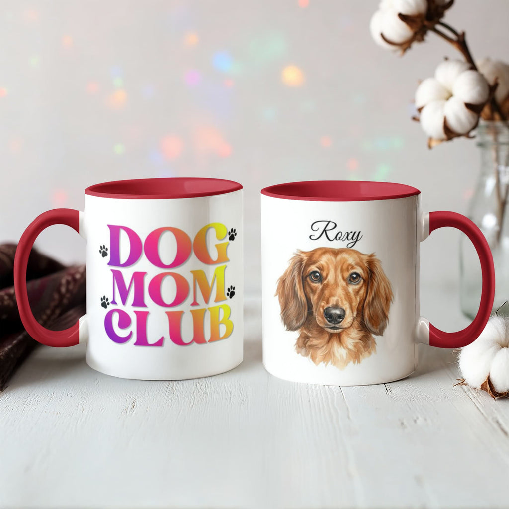 Two mugs with 'Dog Mom Club' and a dachshund illustration on a light background.