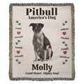Pitbull-themed woven blanket with text and a dog illustration on a beige background