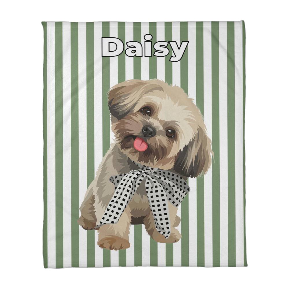 Blanket with a dog illustration and name 'Daisy' on a green and white striped background