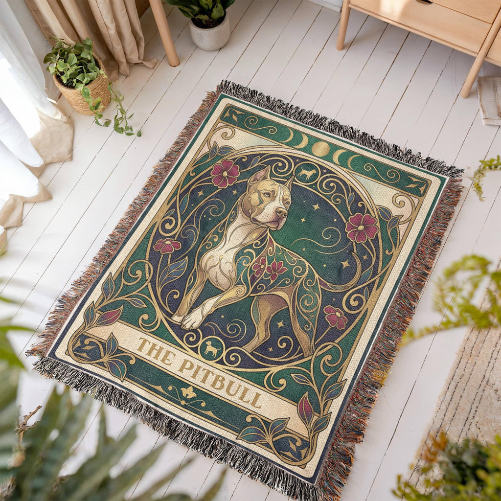 Decorative woven blanket tarot card with a pitbull design on a wooden floor