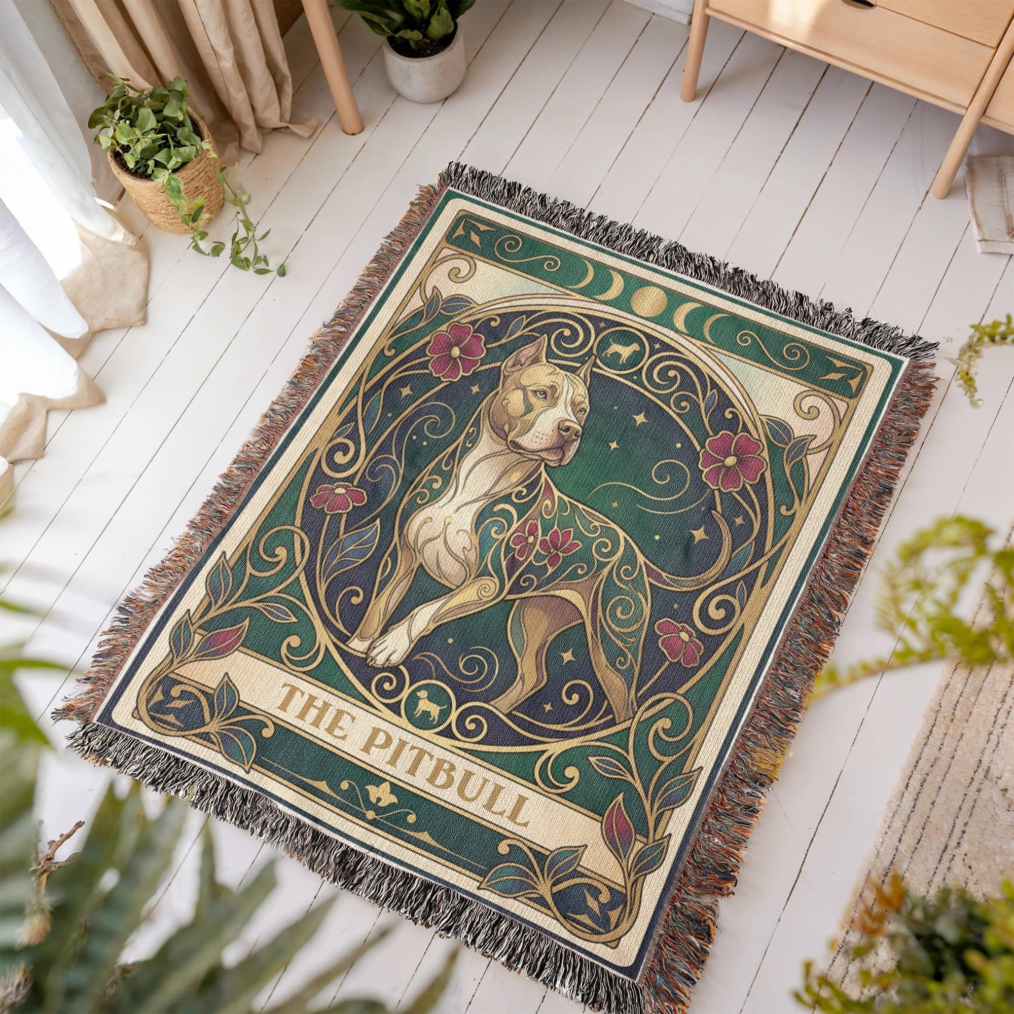 Decorative woven blanket tarot card with a pitbull design on a wooden floor