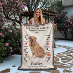 Woman holding a Golden Retriever-themed woven blanket with traits text and a personalized dog photo and name illustration.