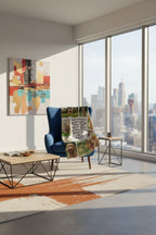 Person holding a blanket with multiple images of a dog and text in a living room.