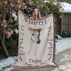 Person holding a blanket with a whippet design and text outdoors in winter. Personalize your Whippit woven blanket with your favorite photo and your dog's name.