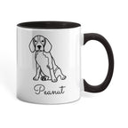 White mug with black interior and handle featuring a dog illustration and the name 'Peanut'.