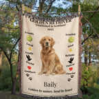 Blanket with a Golden Retriever illustration and text about the breed, displayed outdoors.