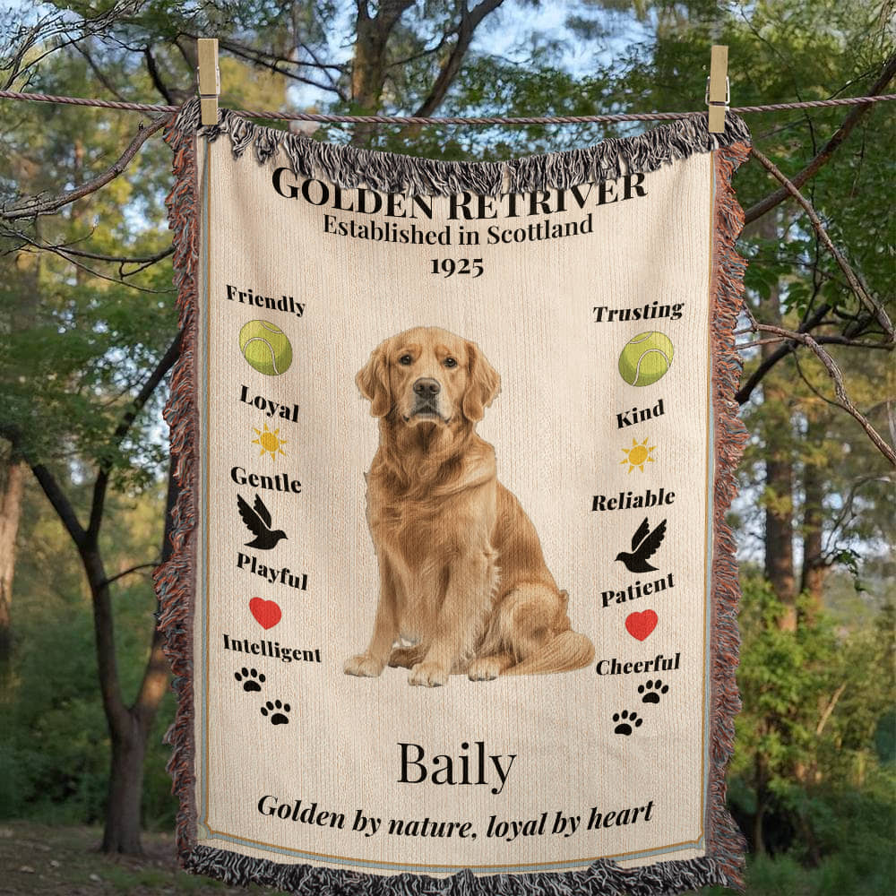 Blanket with a Golden Retriever illustration and text about the breed, displayed outdoors.