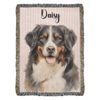 Woven blanket with a dog portrait and the name 'Daisy' on a striped background