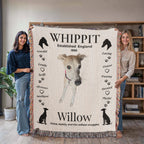 Two people holding a blanket with a whippet design and text. Personalize your woven blanket with your favorite photo of your Whippit.