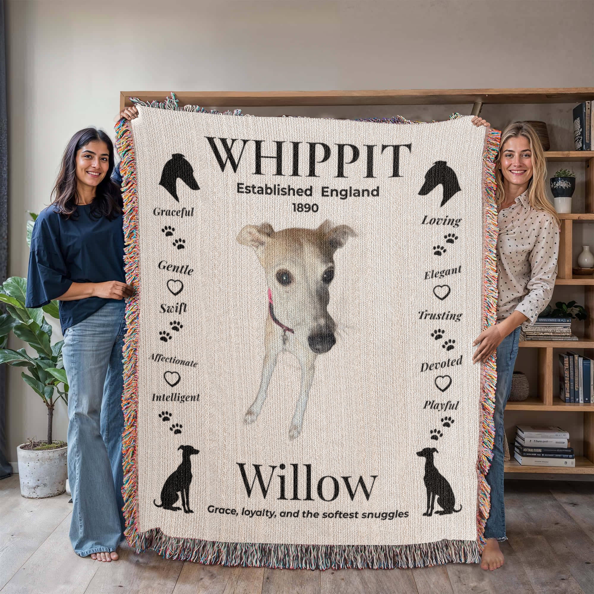 Two people holding a blanket with a whippet design and text. Personalize your woven blanket with your favorite photo of your Whippit.