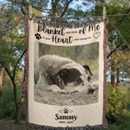 Memorial blanket with a photo of a dog and text in a forest setting