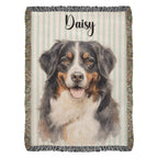 Woven blanket with a dog portrait and the name 'Daisy' on a striped background