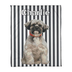 Personalized blanket with a dog illustration and name 'Charlie' on a striped background