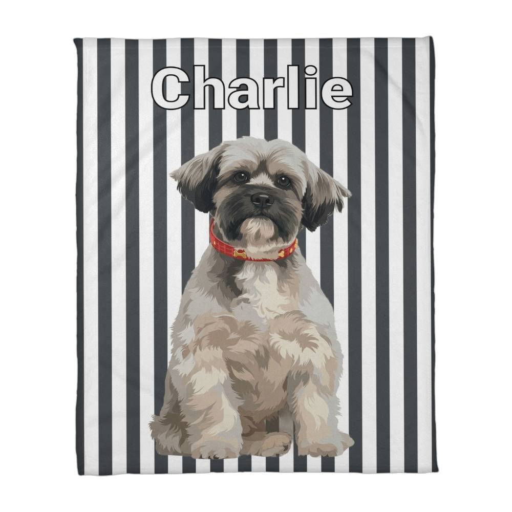 Personalized blanket with a dog illustration and name 'Charlie' on a striped background