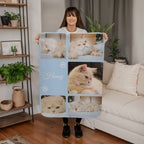 Person holding a blanket with cat images and the word 'Honey' in a living room setting.