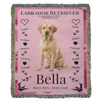 Pink blanket with a Labrador Retriever design, featuring the dog's name 'Bella' and various dog-related words.Personalize your woven blanket with your favorite Labrador's photo and Name.
