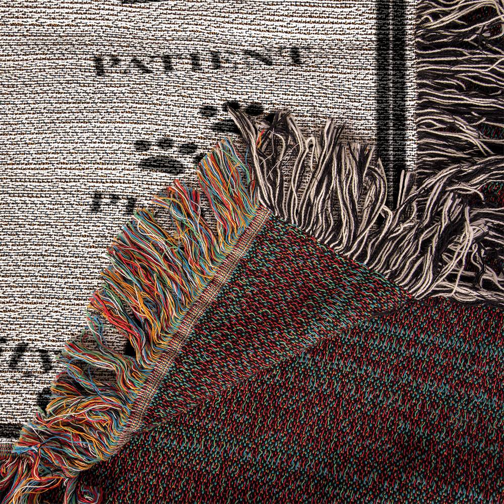 Textile with colorful fringes on a textured background