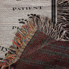 Textile with colorful fringes on a textured background